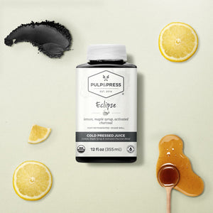 natural detoxifier eclipse cold pressed juice made with lemon maple syrup activated charcoal 